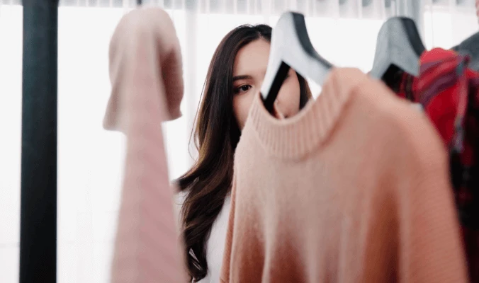 woman looking at her closet