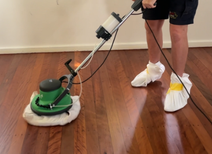 applying hard wax oil to timber floors