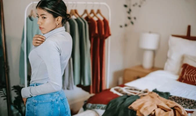 woman fitting clothes