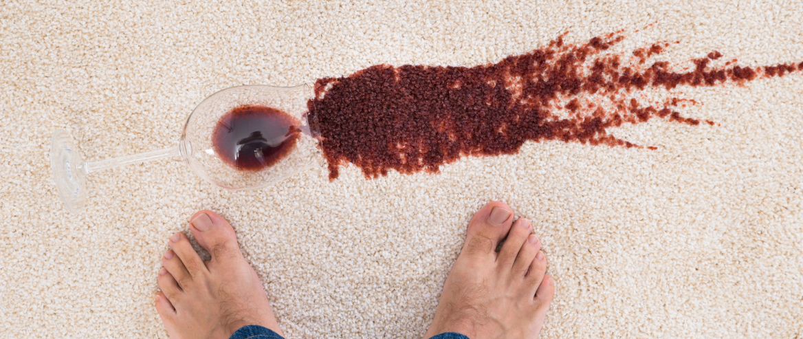 Hero Glass Of Red Wine Spilt On Cream Carpet